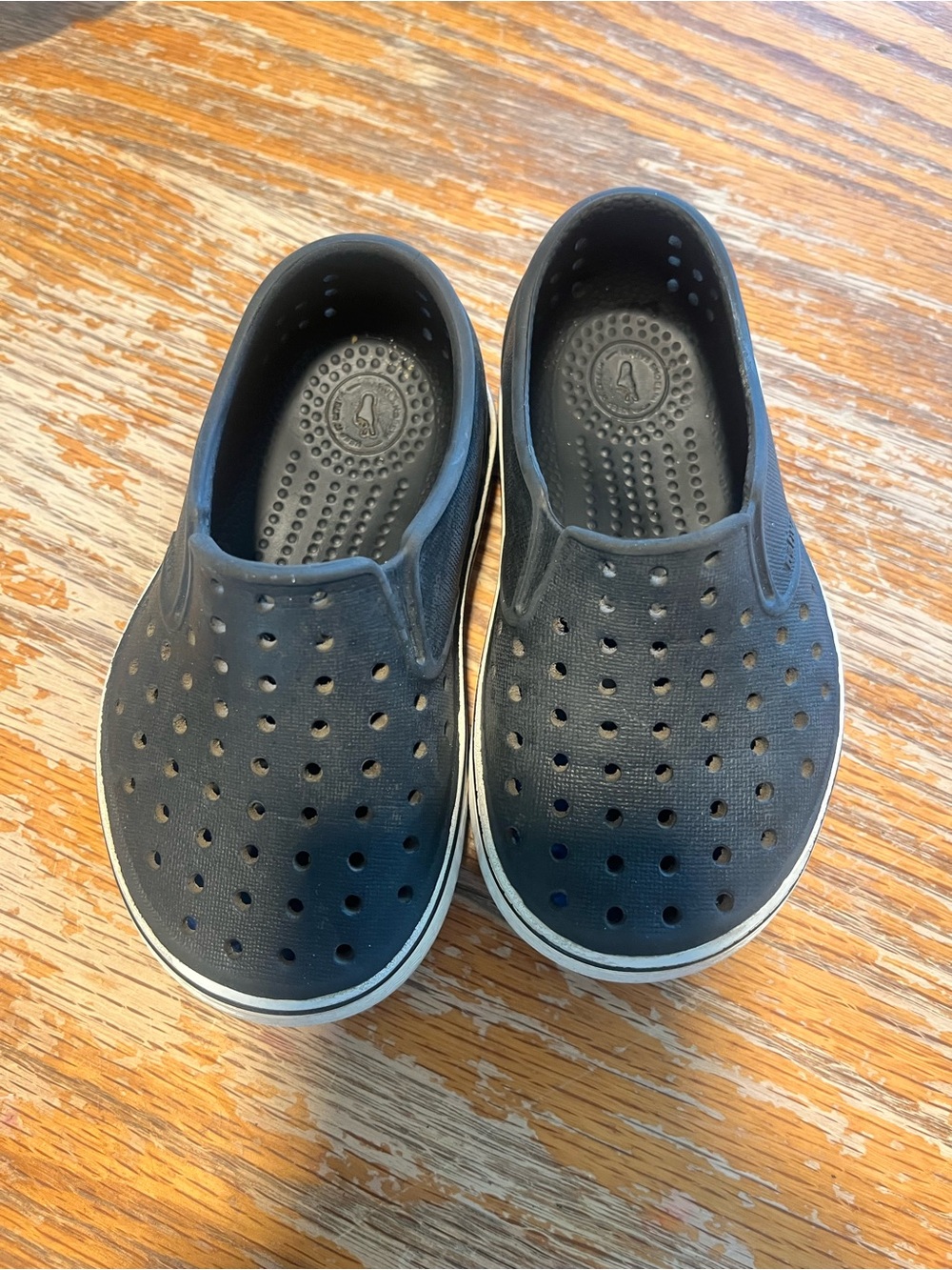 Native brand slip on shoes